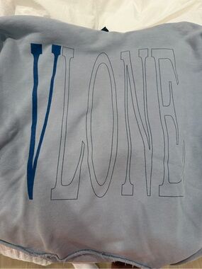 VLONE  Staple Light Blue Hoodie with Dark Blue 'V' Outline